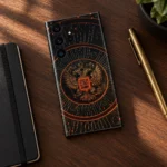 Coat of Arms of Russia mobile skin with gold eagle crest, walnut desk flat lay
