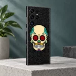 Rose Skull Mobile Skin with red rose eyes and colourful floral details, concrete studio view