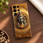 Shiv Art mobile skin with silver Shiva portrait and golden mandala - walnut flatlay