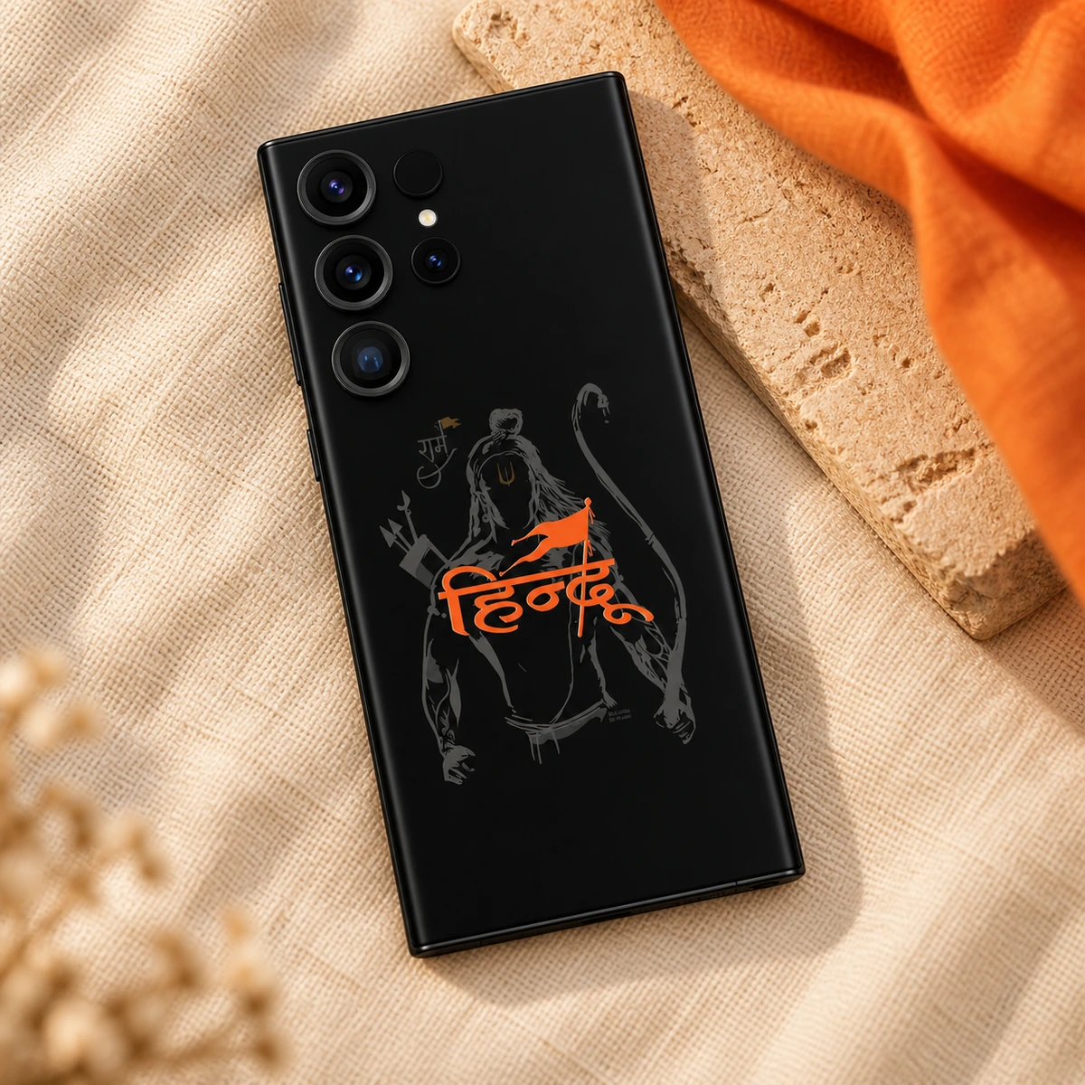 Shree Ram Hindu Calligraphy Mobile Skin - Linen flatlay Shree Ram Hindu black mobile skin on cream linen with a saffron accent
