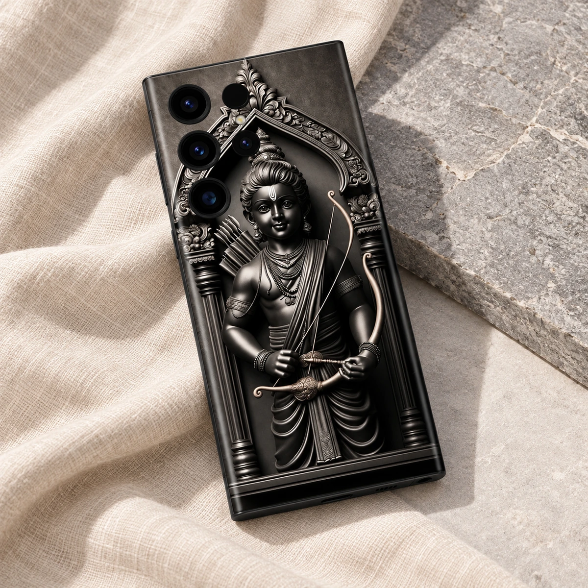 Shree Ram Monochrome Statue Mobile Skin - Linen flatlay Shree Ram bow and arrow statue mobile skin on ivory linen beside silver grey stone
