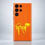 Close view of yellow Shree Ram Hindi lettering and repeated text pattern on orange mobile skin