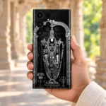 Shree Venkatesh Balaji Mobile Skin held in hand in a bright stone corridor