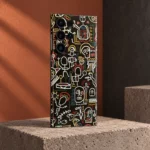 Black Skull Doodle Pattern mobile skin with cream line art, terracotta studio angle