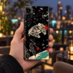 Star Wars mobile skin with Millennium Falcon and TIE fighter artwork on black, city terrace handheld