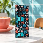 Teal Coral Abstract Doodle Mobile Skin shown in aqua cafe angled view