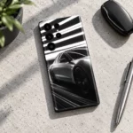 Tesla car mobile skin in black white and silver with light streaks, concrete flat lay