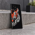 Tiger Face Graphic Mobile Skin shown on an urban concrete step