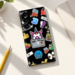 Unicorn Social Sticker Pattern Mobile Skin shown in daylight desk flat lay