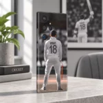 Virat Kohli mobile skin showing VIRAT 18 on a white Test jersey, fan study angle
