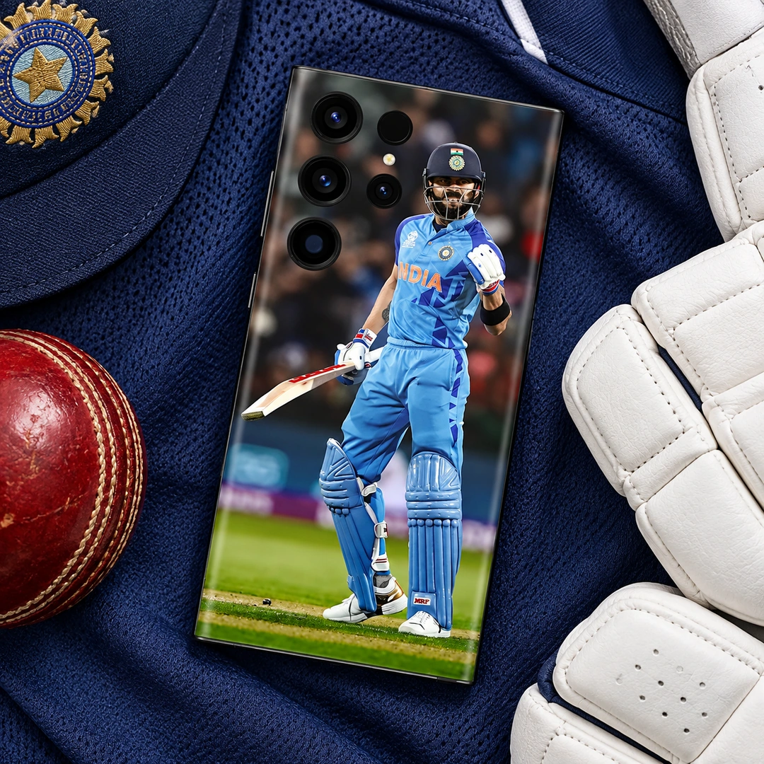 Virat Kohli Blue India Celebration Mobile Skin – Cricket kit flat lay Virat Kohli Blue India Celebration Mobile Skin, cricket kit flat lay with raised gloved fist and cricket bat