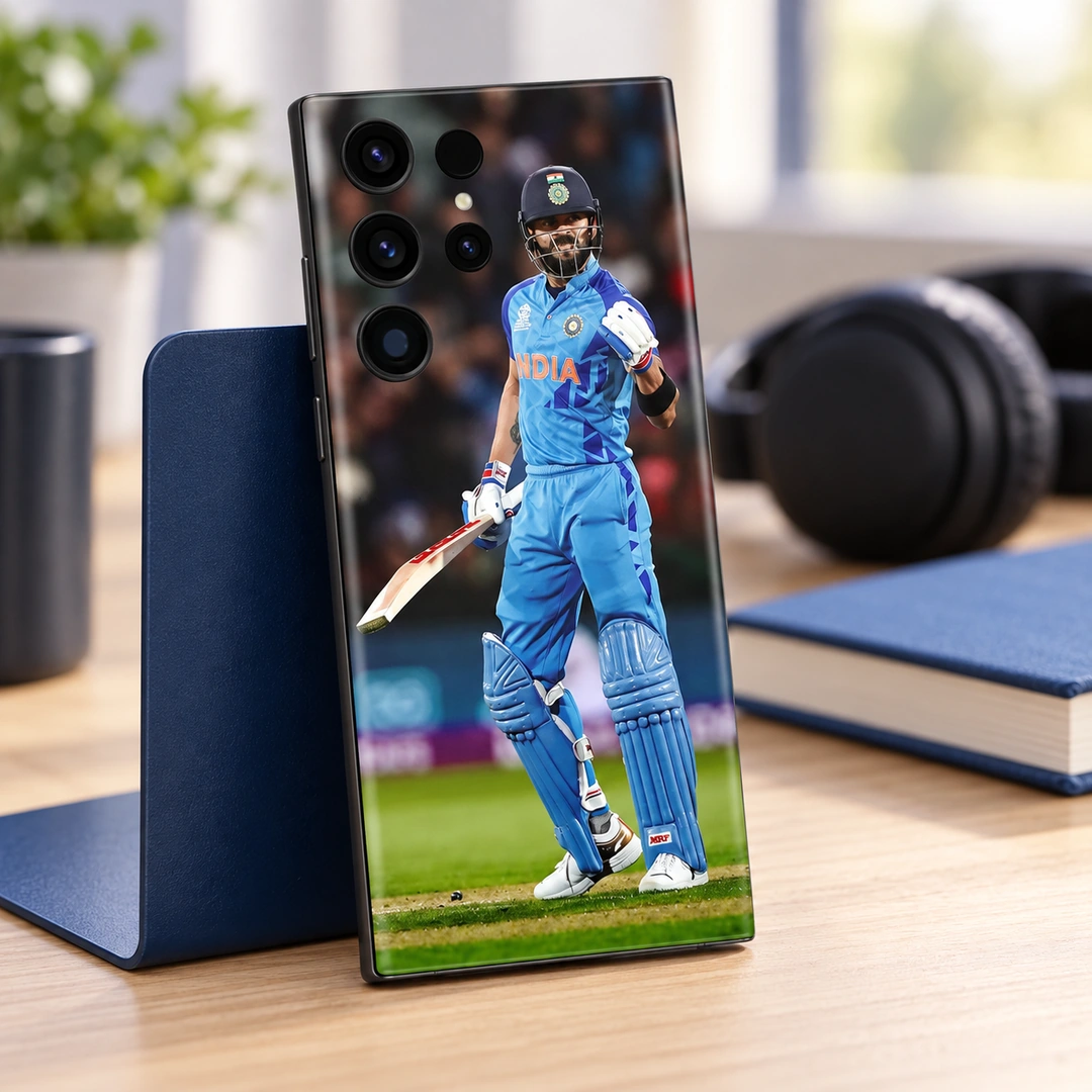 Virat Kohli Blue India Celebration Mobile Skin – Fan desk view Virat Kohli Blue India Celebration Mobile Skin, fan desk view with raised gloved fist and cricket bat
