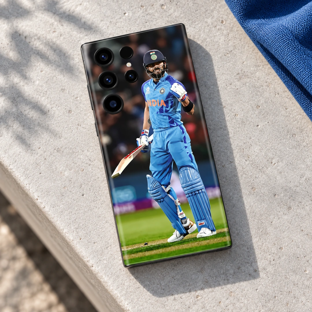 Virat Kohli Blue India Celebration Mobile Skin – Stone bench view Virat Kohli Blue India Celebration Mobile Skin, stone bench view with raised gloved fist and cricket bat