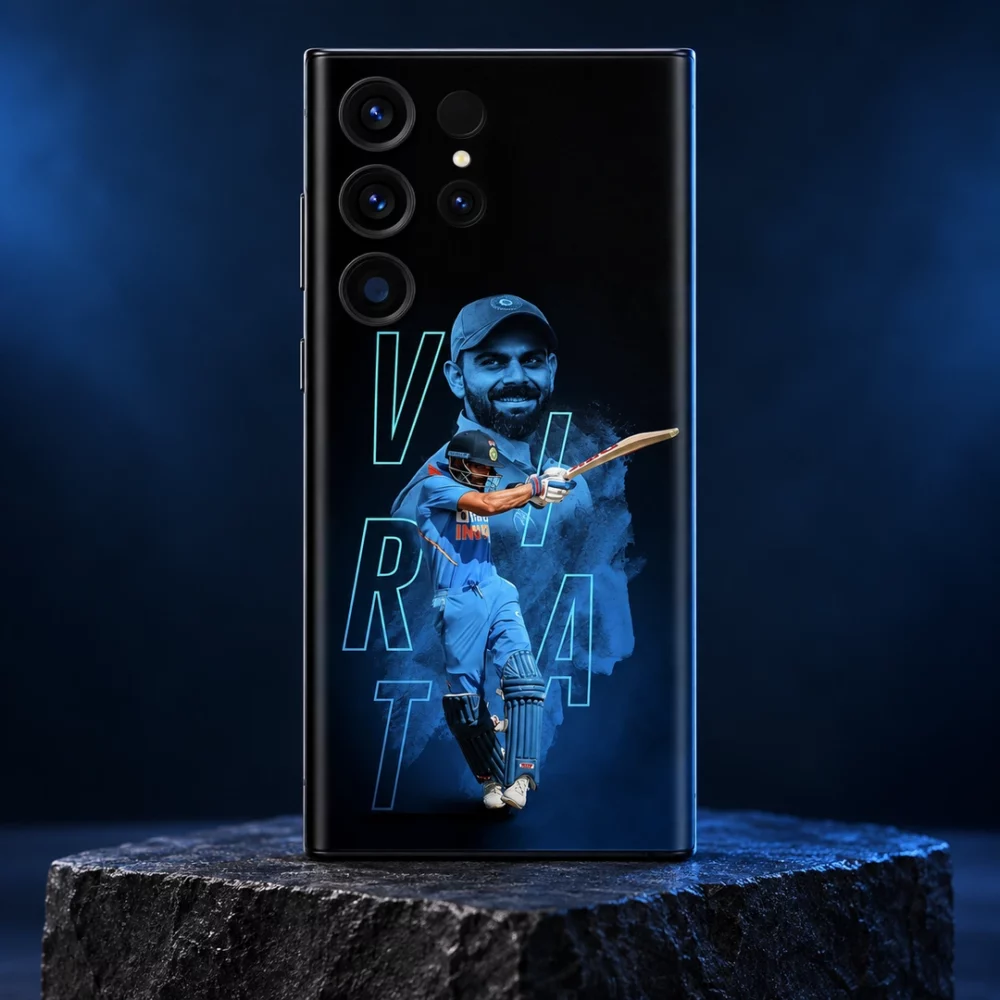 Virat Kohli mobile skin with blue portrait, batting pose and VIRAT outline lettering, navy studio hero