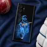 Virat Kohli mobile skin with blue portrait, batting pose and VIRAT outline lettering, cricket flat lay