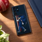 Virat Kohli navy batting montage mobile skin, walnut desk