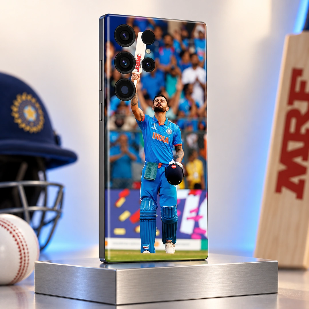 Virat Kohli Photo Mobile Skin - Silver Studio View Virat Kohli Photo Mobile Skin with raised bat and blue India jersey, silver studio view