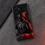 Chhatrapati Shivaji Maharaj mobile skin with black statue portrait and red turban, slate flat lay