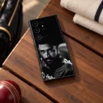 Black mobile skin with monochrome MS Dhoni portrait, walnut bench view