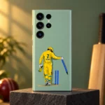 Sage green Dhoni vector mobile skin with yellow jersey, number 7 and DHONI lettering on a warm studio plinth