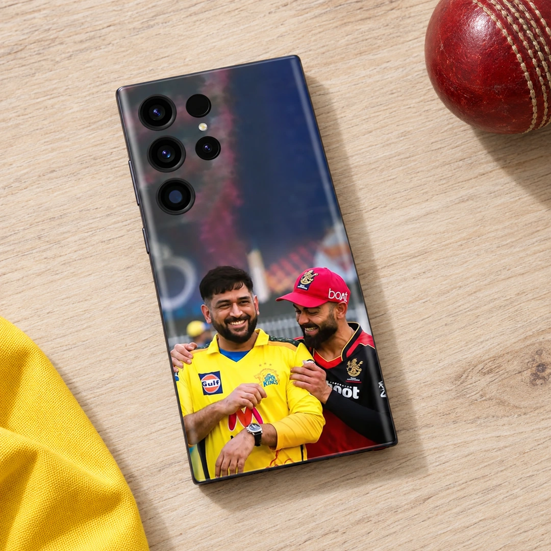 Dhoni and Virat Kohli Photo Mobile Skin - Cricket table flat lay Dhoni and Virat Kohli smiling in yellow and red cricket jerseys on a mobile skin, cricket table flat lay