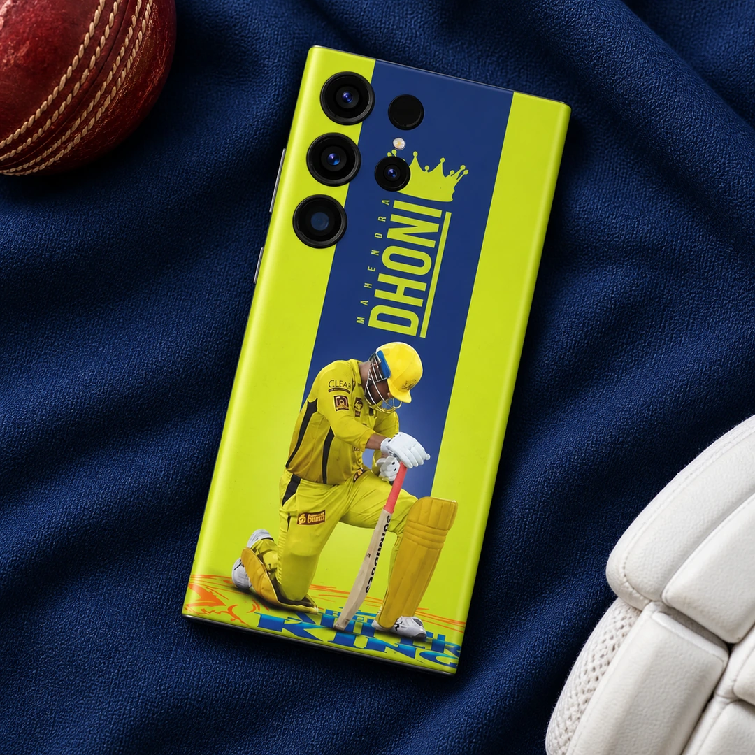 Dhoni Yellow Jersey Crown Mobile Skin - cricket essentials flat lay Yellow Dhoni photo mobile skin with crown, vertical MAHENDRA DHONI lettering and kneeling cricketer, cricket essentials flat lay