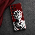 Goku mobile skin with black and white portrait on burgundy, charcoal concrete flat lay