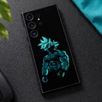 Goku mobile skin with cyan spiky-haired silhouette and clenched fists on black, textured mat flat lay