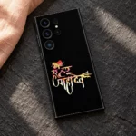 Colourful Mahadev calligraphy mobile skin styled on slate with peach linen