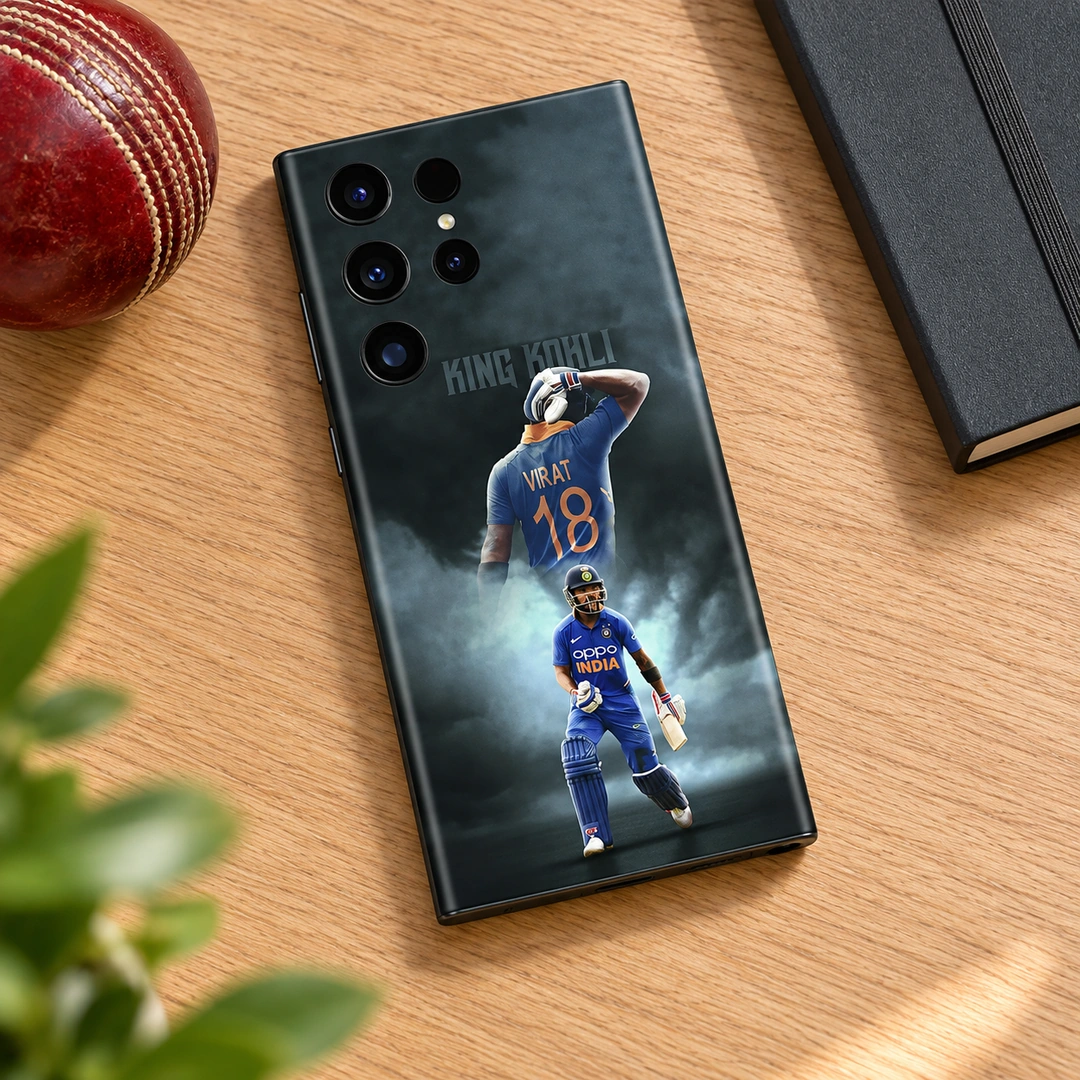 King Kohli Virat 18 Mobile Skin - Cricket desk flat lay King Kohli mobile skin with VIRAT 18 jersey and blue India cricket portraits, cricket desk flat lay