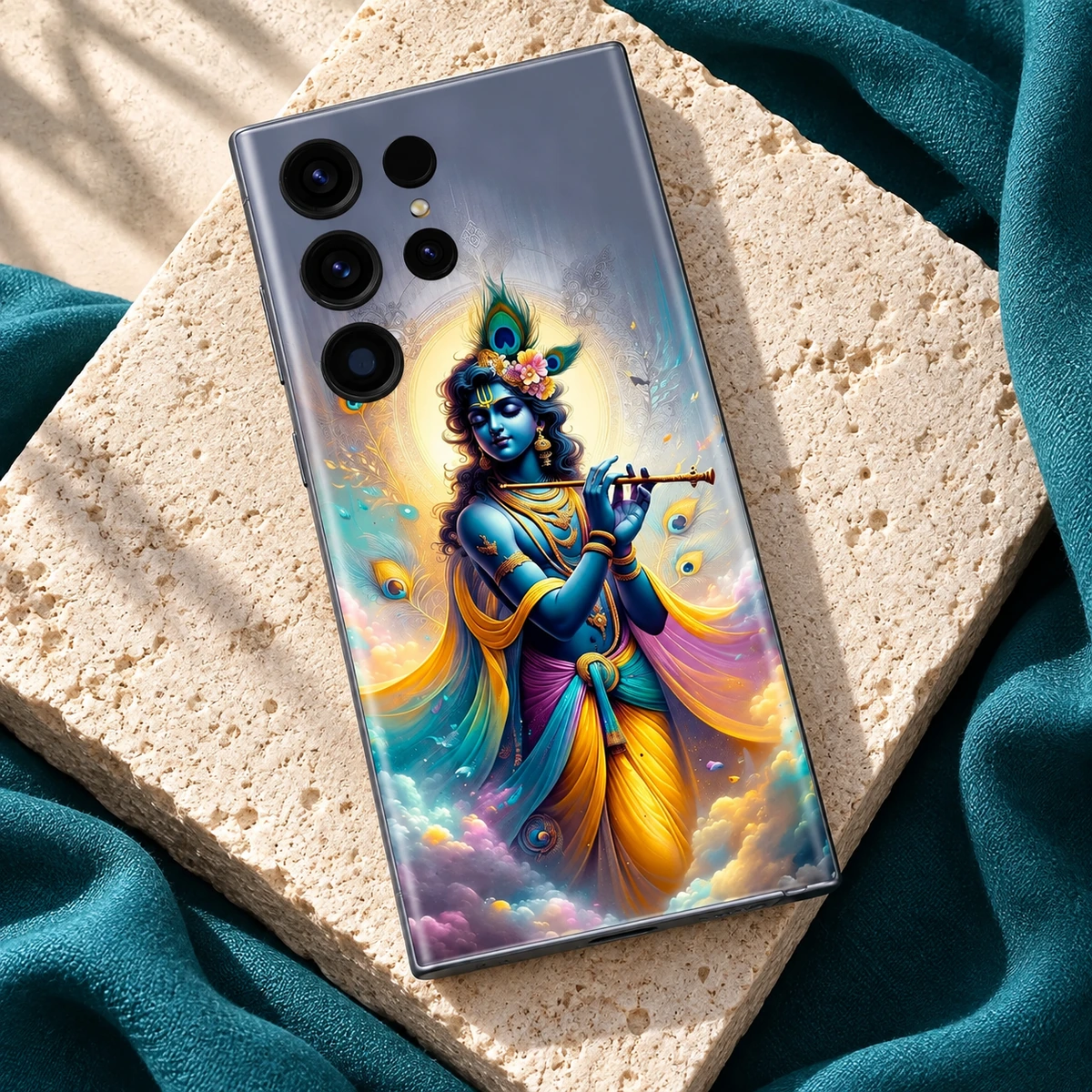Krishna Flute Painting Mobile Skin - teal flat lay Krishna flute painting mobile skin on pale stone with teal fabric and warm sunlight