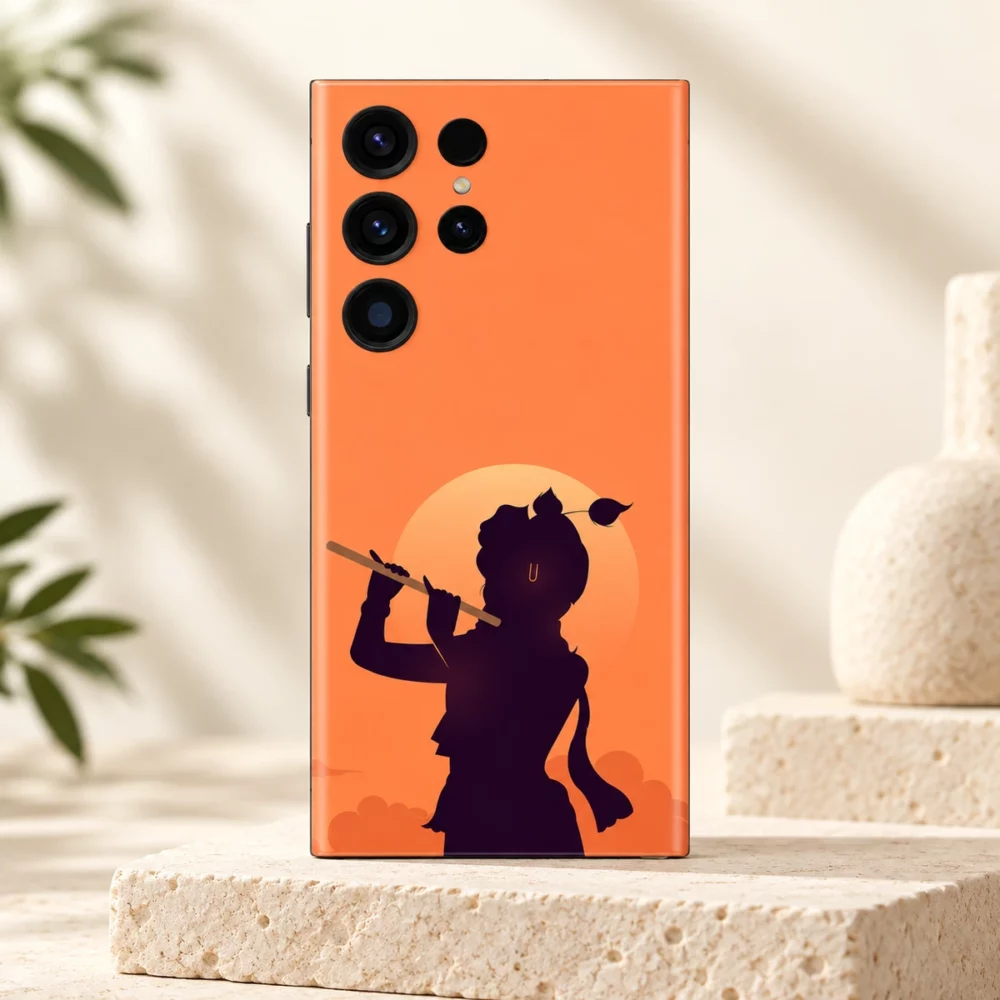 Krishna sunset silhouette mobile skin with flute and pale sun on coral orange – clean studio hero