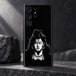 Close view of white Shiva face and red forehead accent printed on black mobile skin