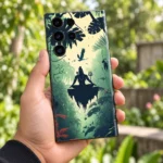 Mahadev forest mobile skin held in hand in a green garden