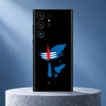 Mahadev Blue Shiva Face Mobile Skin with white tripundra and red tilak on a grey pedestal