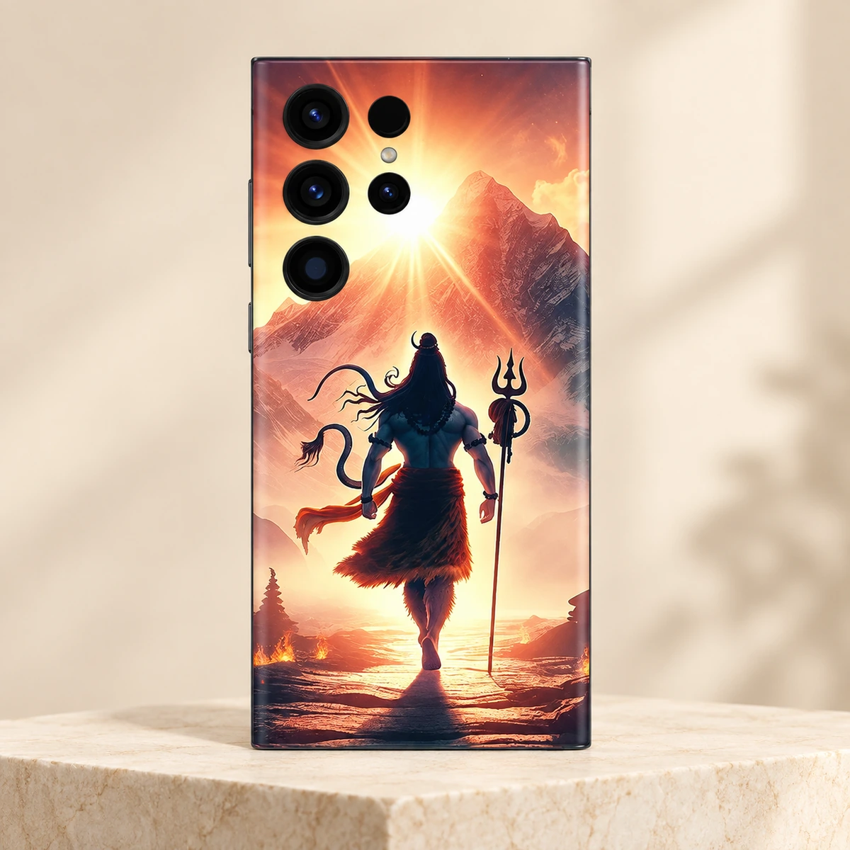 Mahadev Mountain Sunrise Mobile Skin - Ivory studio hero Mahadev mobile skin showing Shiva and trishul against a golden mountain sunrise, ivory studio hero