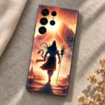 Mahadev mobile skin showing Shiva and trishul against a golden mountain sunrise, stone flat lay