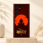 Mahadev orange sun and gold script mobile skin upright on a sandstone plinth