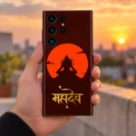Mahadev orange sun mobile skin held in hand on a rooftop at sunset