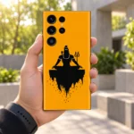 Mahadev saffron meditation mobile skin with black Shiva silhouette and trident – in-hand lifestyle