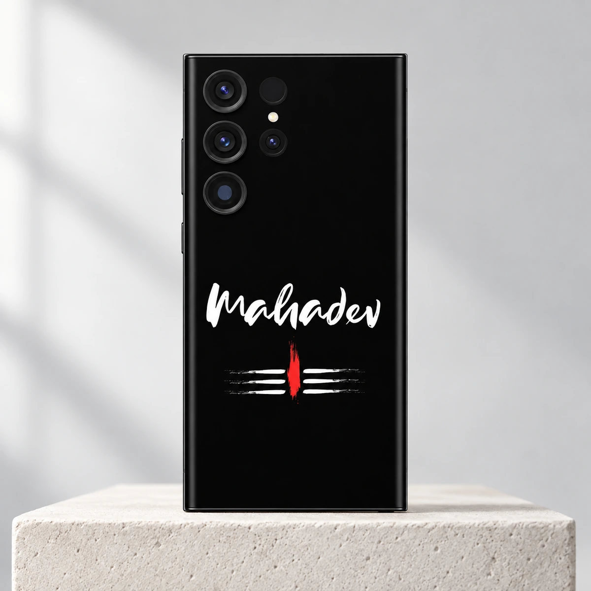 Mahadev White Script Tripundra Mobile Skin - Ivory hero Mahadev White Script Tripundra Mobile Skin upright on a pale ivory pedestal