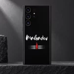 Close view of white Mahadev brush lettering and tripundra with red tilak on black mobile skin
