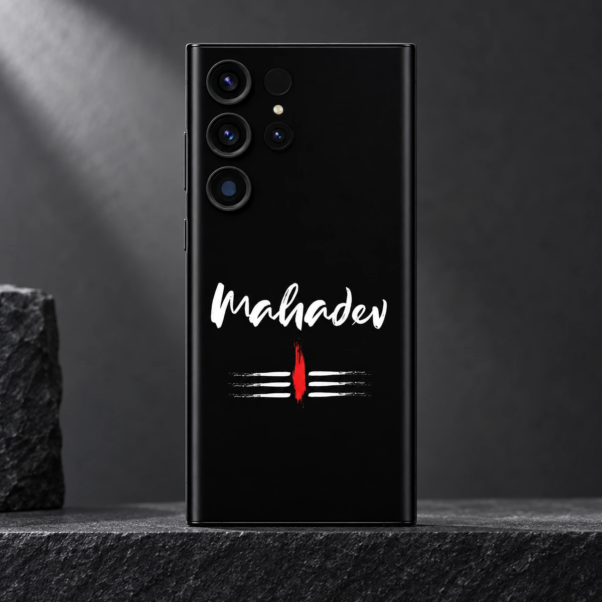 Mahadev White Script Tripundra Mobile Skin - Lettering detail Close view of white Mahadev brush lettering and tripundra with red tilak on black mobile skin