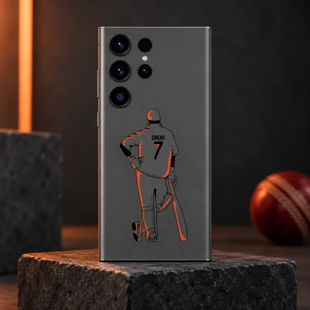 Grey mobile skin with orange MS Dhoni illustration and DHONI 7 lettering, hero cricket studio