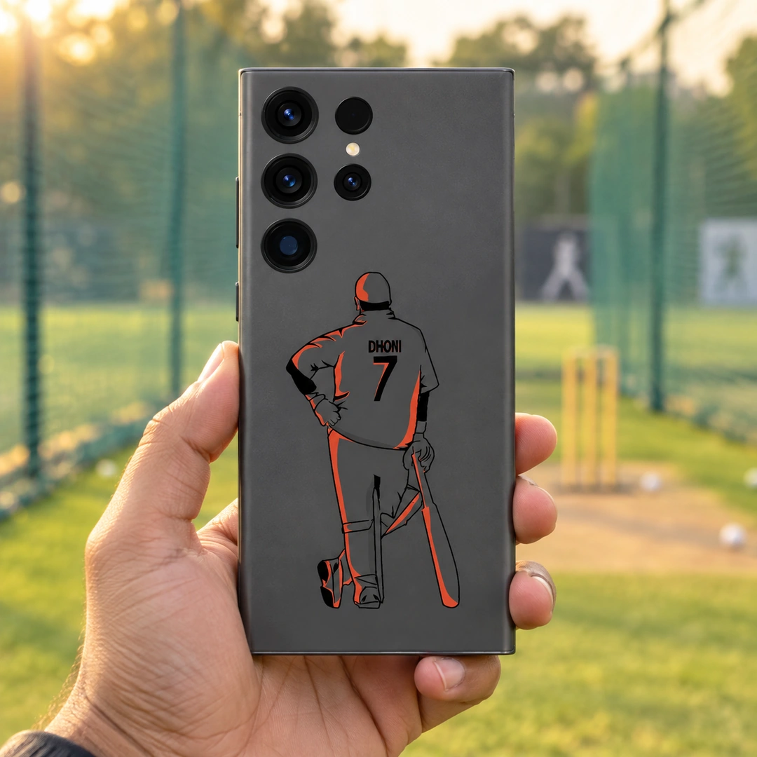 MS Dhoni 7 Grey and Orange Mobile Skin - Cricket Net Handheld Grey mobile skin with orange MS Dhoni illustration and DHONI 7 lettering, cricket net handheld