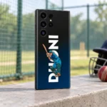 MS Dhoni mobile skin with blue batting illustration and vertical DHONI lettering, practice nets angle