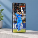 MS Dhoni batting photo mobile skin, three-quarter view against blue wall
