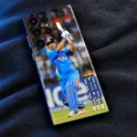 MS Dhoni batting photo mobile skin, close studio view on charcoal cloth