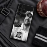MS Dhoni Black and White Portrait Mobile Skin, cricket bag flat lay showing the original smiling portrait and cap