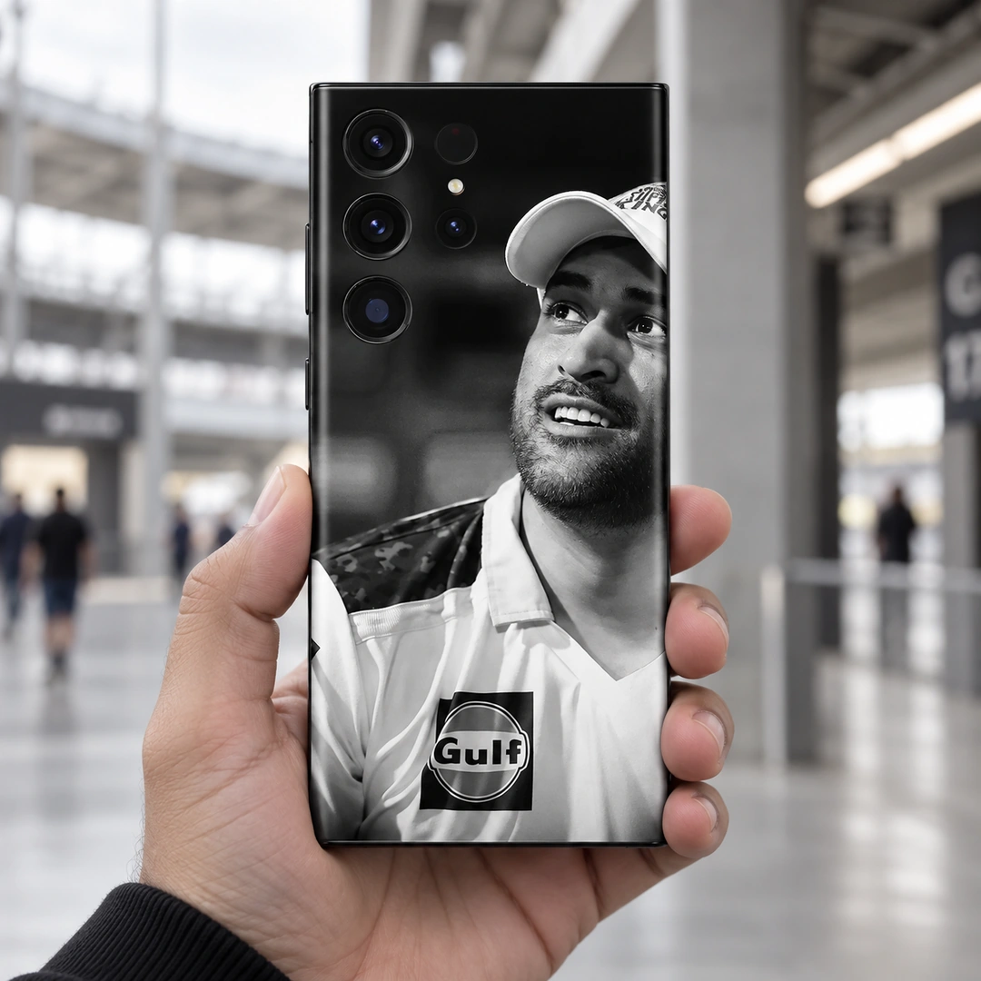 MS Dhoni Black and White Portrait Mobile Skin – Stadium handheld view MS Dhoni Black and White Portrait Mobile Skin, stadium handheld view showing the original smiling portrait and cap